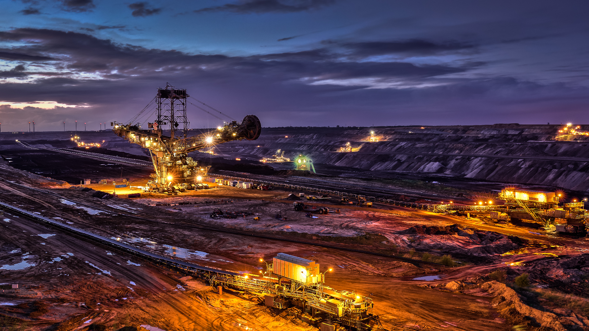Heavy mining equipment at an open-pit mine